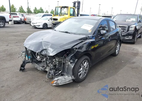 2018 Toyota Yaris Ia из США, поврежденный, VIN 3MYDLBYV5JY315860